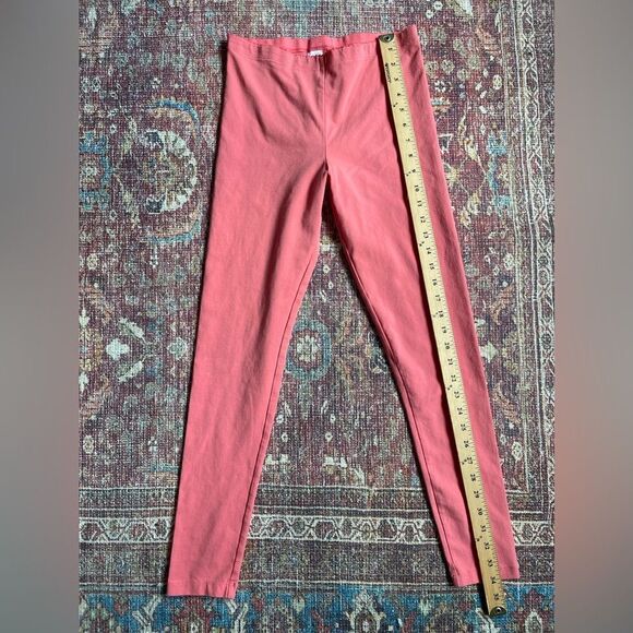 Girls size 16 Tea Collection leggings in coral pink ruffle like detail waist - Picture 2 of 8